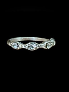 Size 4 Silver plated perhaps and Crystal Accent Wave Ring -